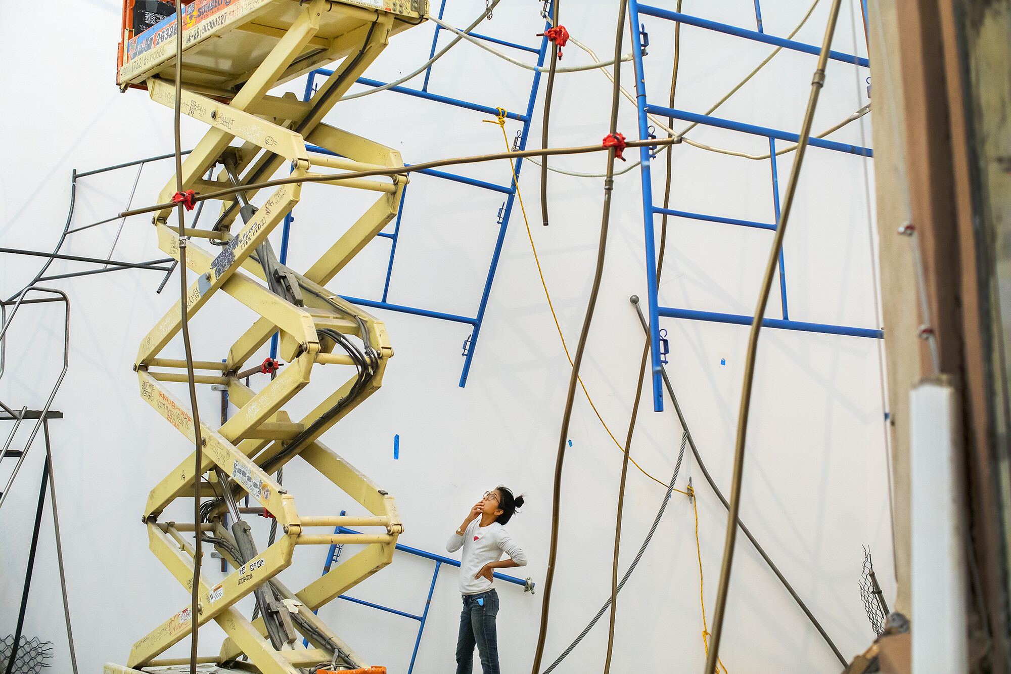 Michelle Lopez overseeing her art installation at the ICA.