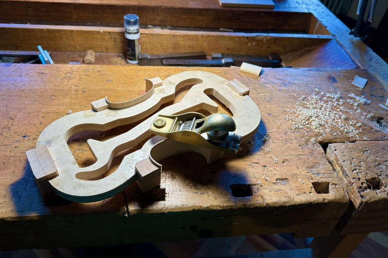 Rib of a violin being made.
