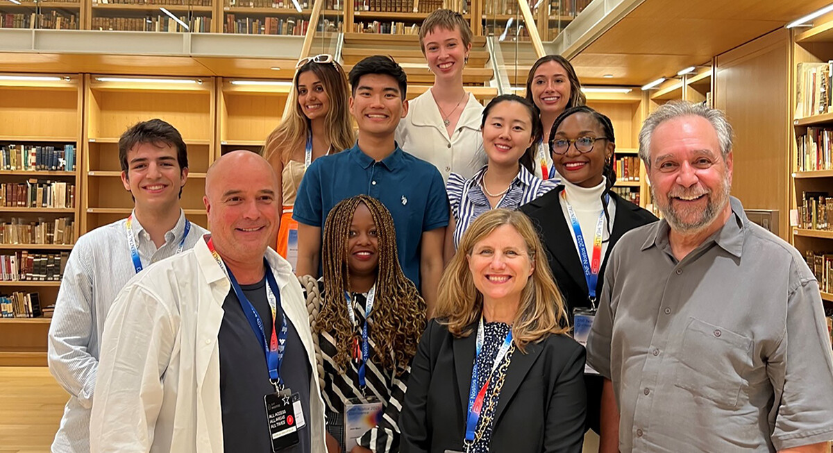 A group of people including Penn President Liz Magill and Michael Delli Carpini.
