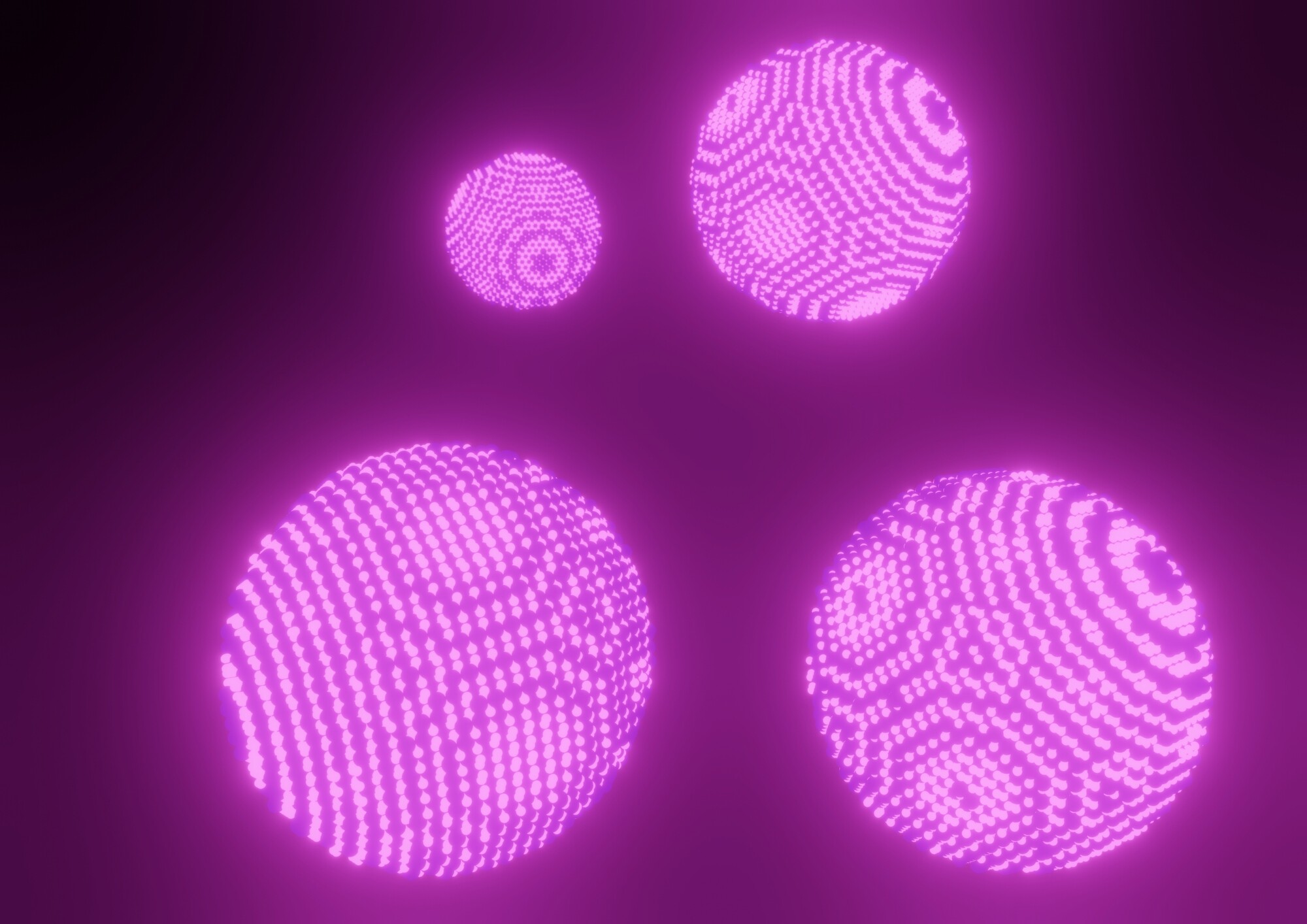 Artist's impression of spherical binary nanocrystal superlattices featuring semiconductor (emissive) and magnetic/plasmonic (non-emissive) nanocrystals.