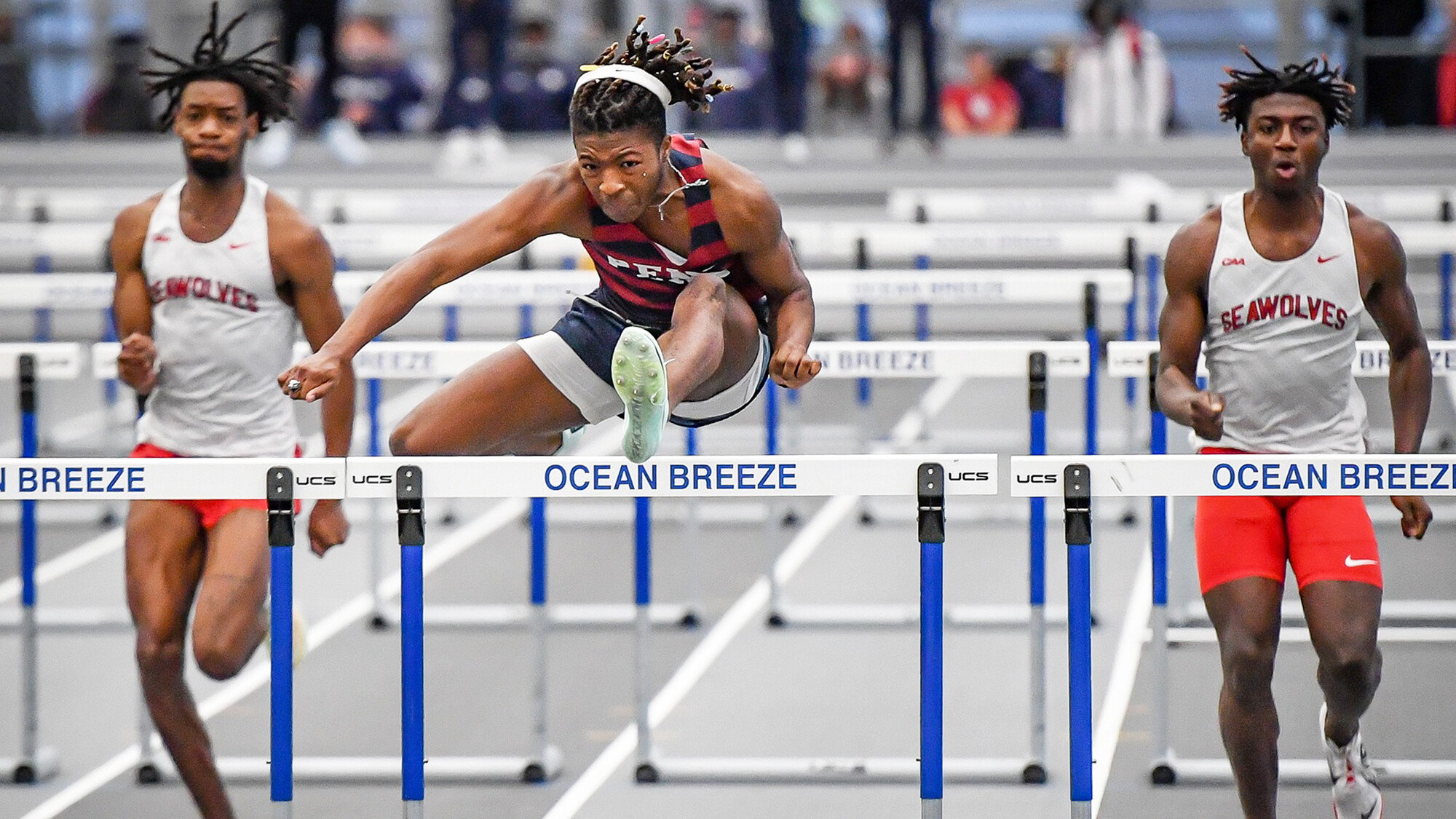 Shane Gardner leaps over a hurdle during a race in Staten Island.