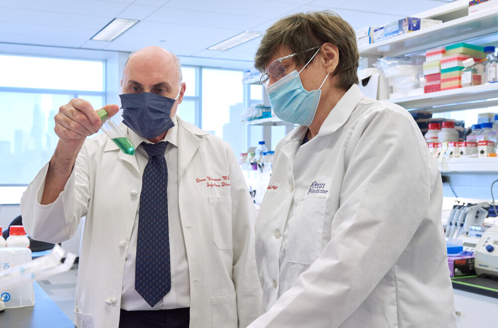 weissman and kariko working in their lab