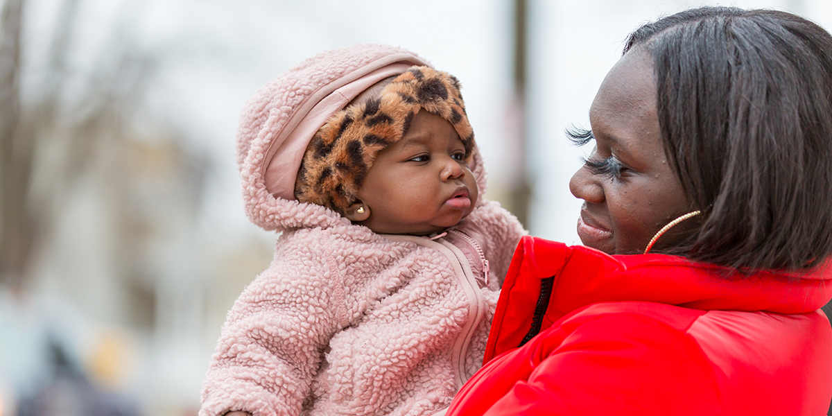 talicia holding her child