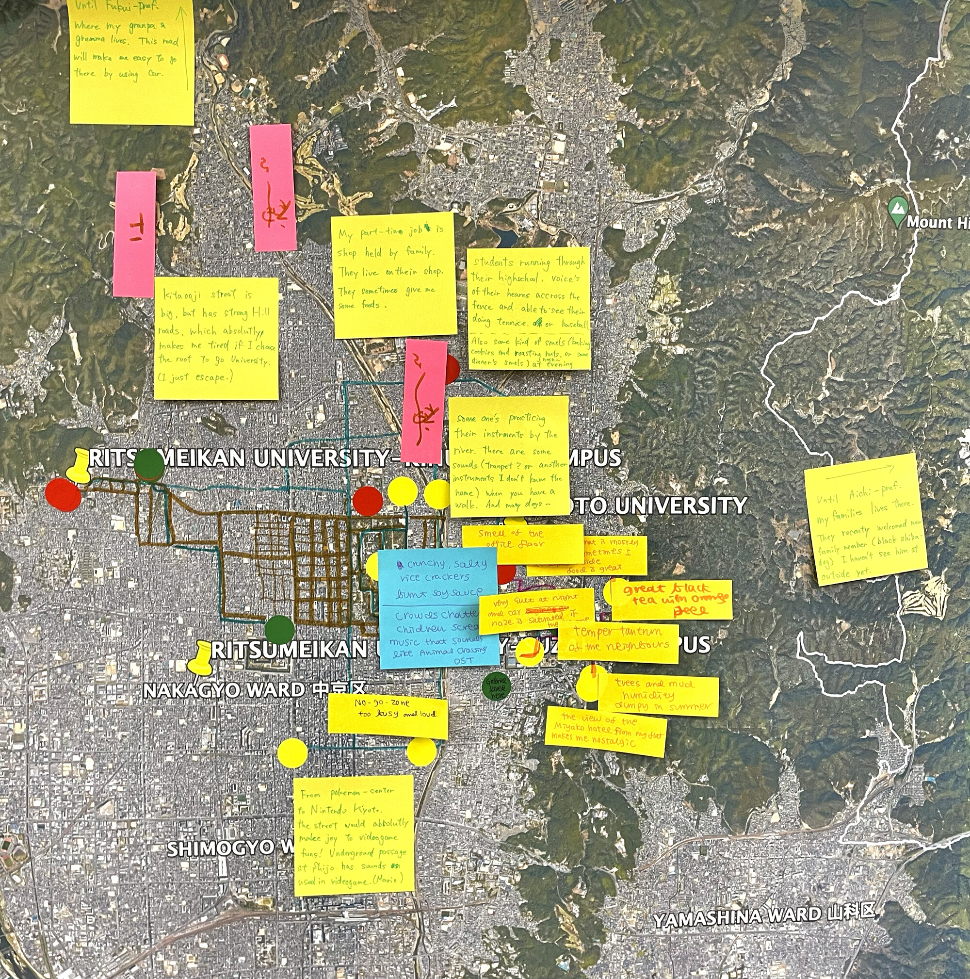 A map with Post-It notes as part of a collage.