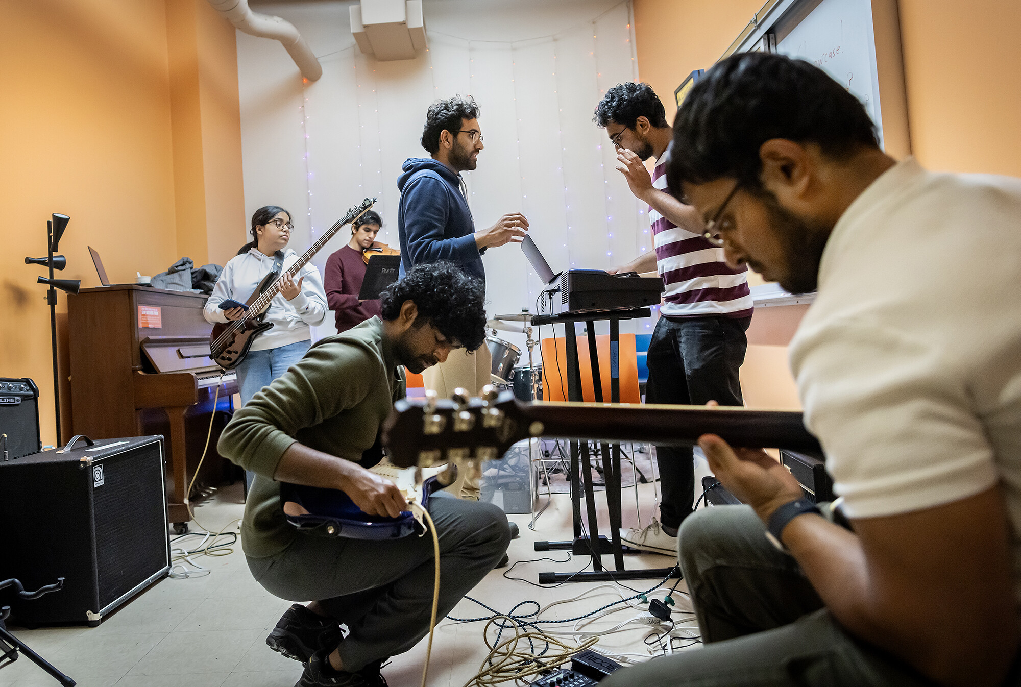 Members of a Penn musical group rehearsing.