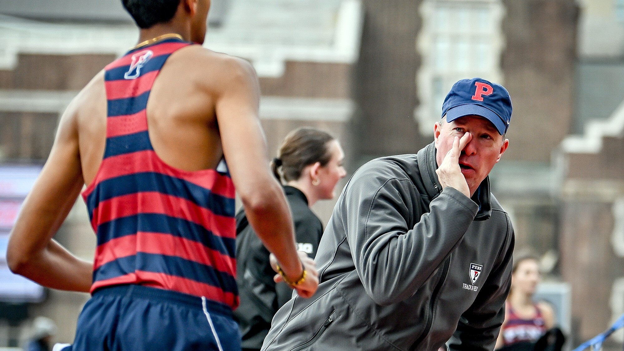 Steve Dolan calls out to an athlete during a meet.