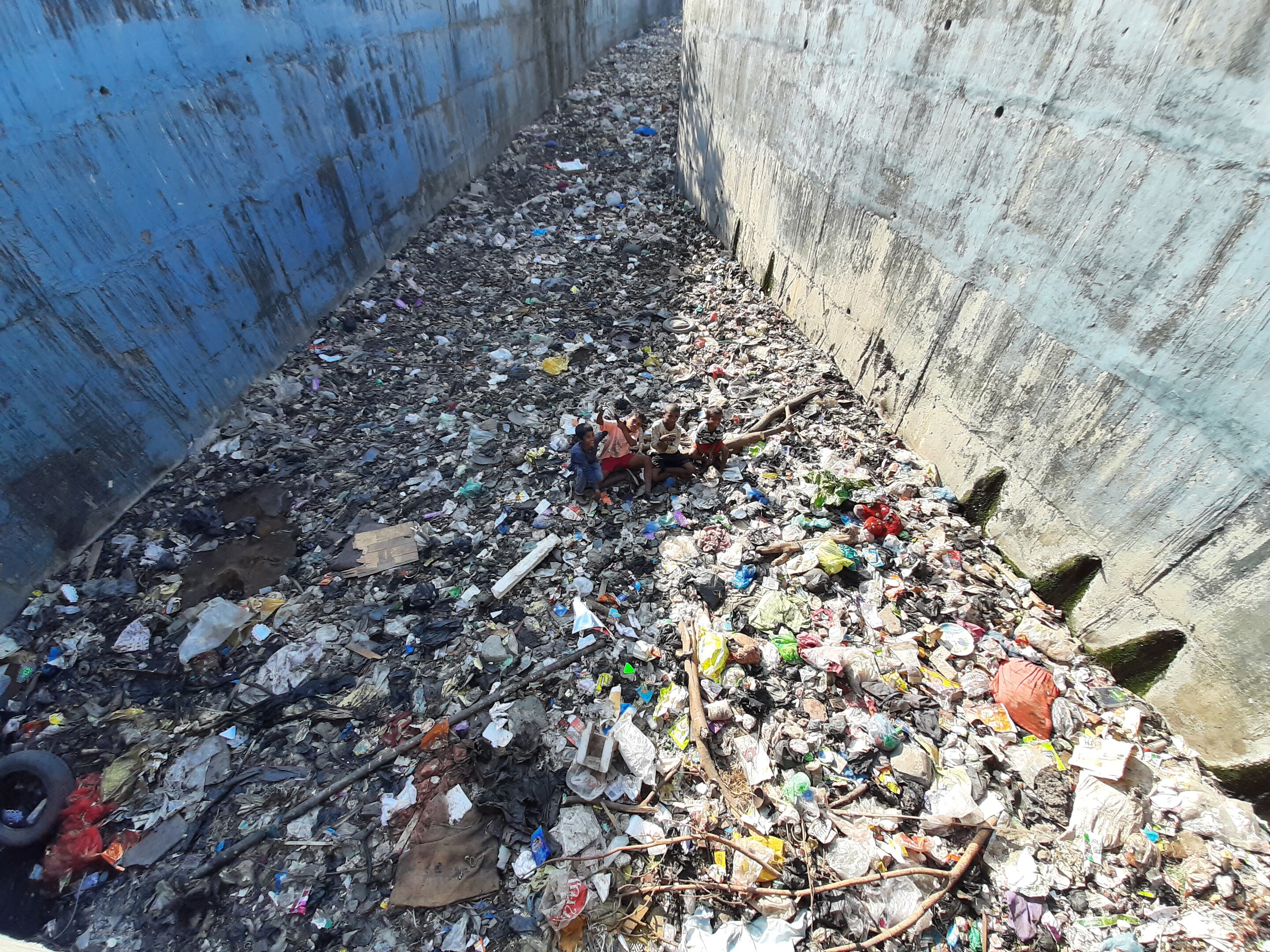Plastics accumulated in a sewer in India.