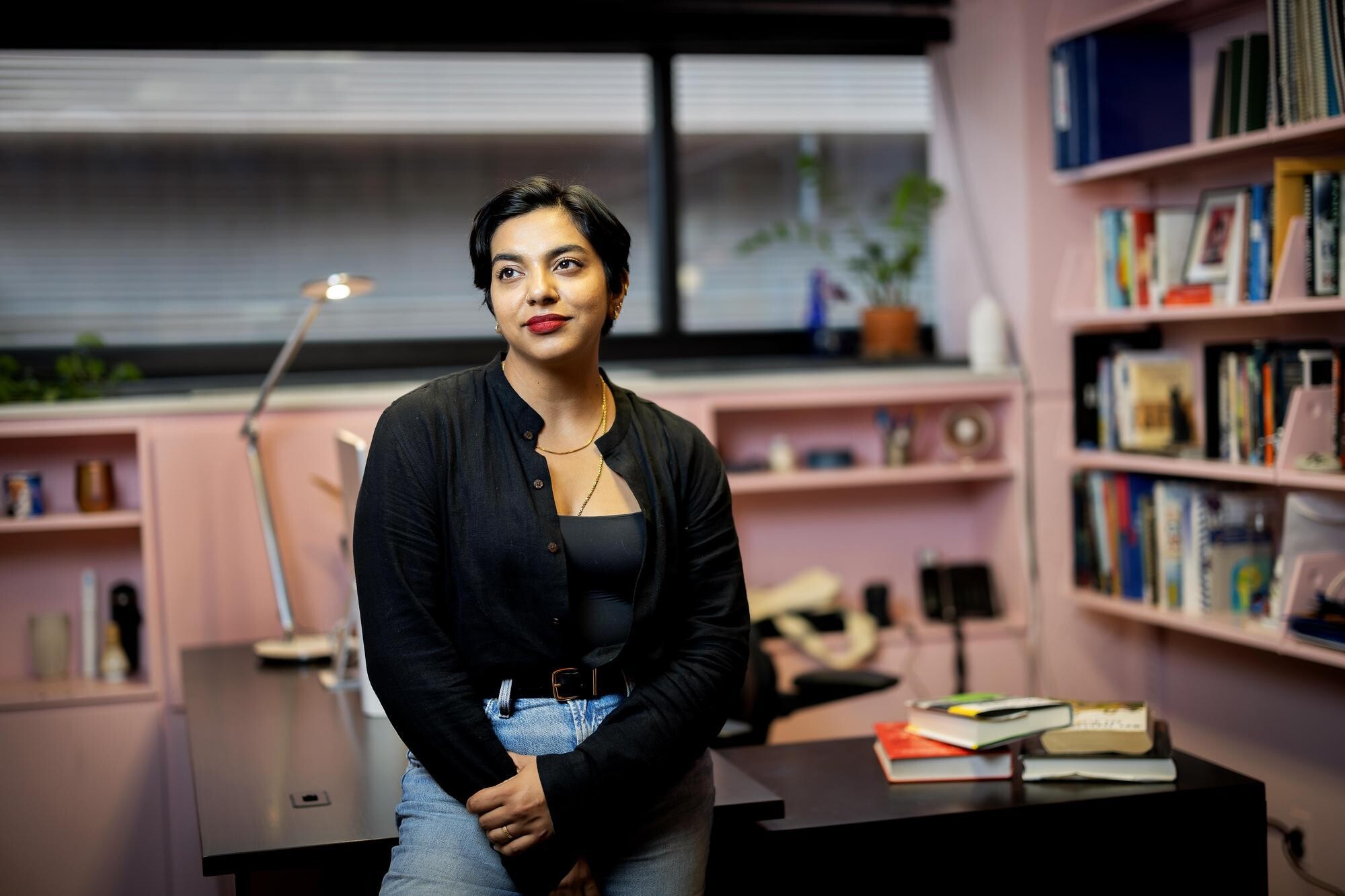Mallika Sarma stands in her office.