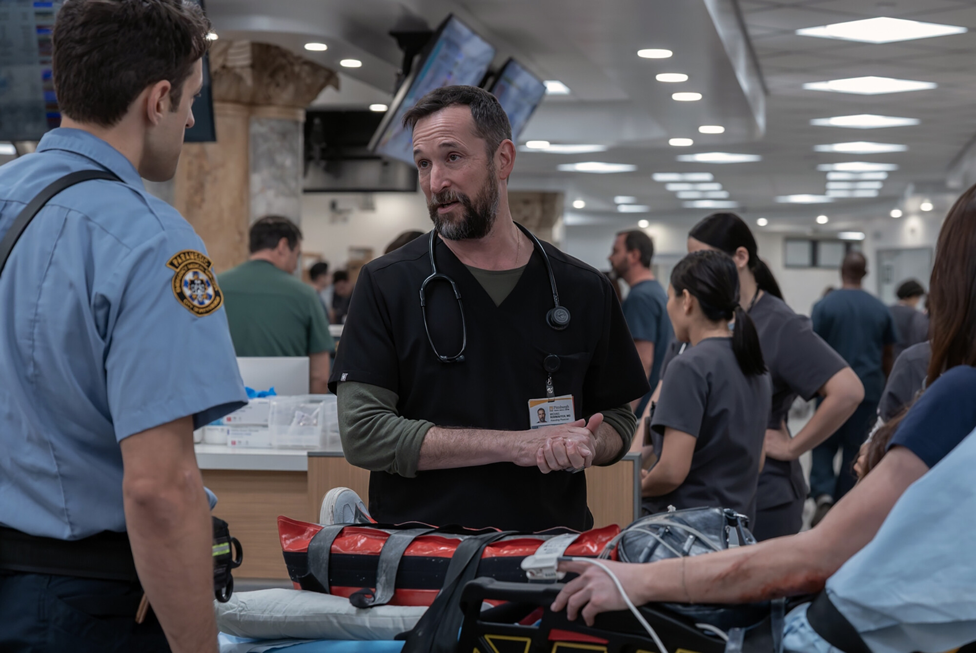 Noah Wyle acting a scene from “The Pitt” in an ER.