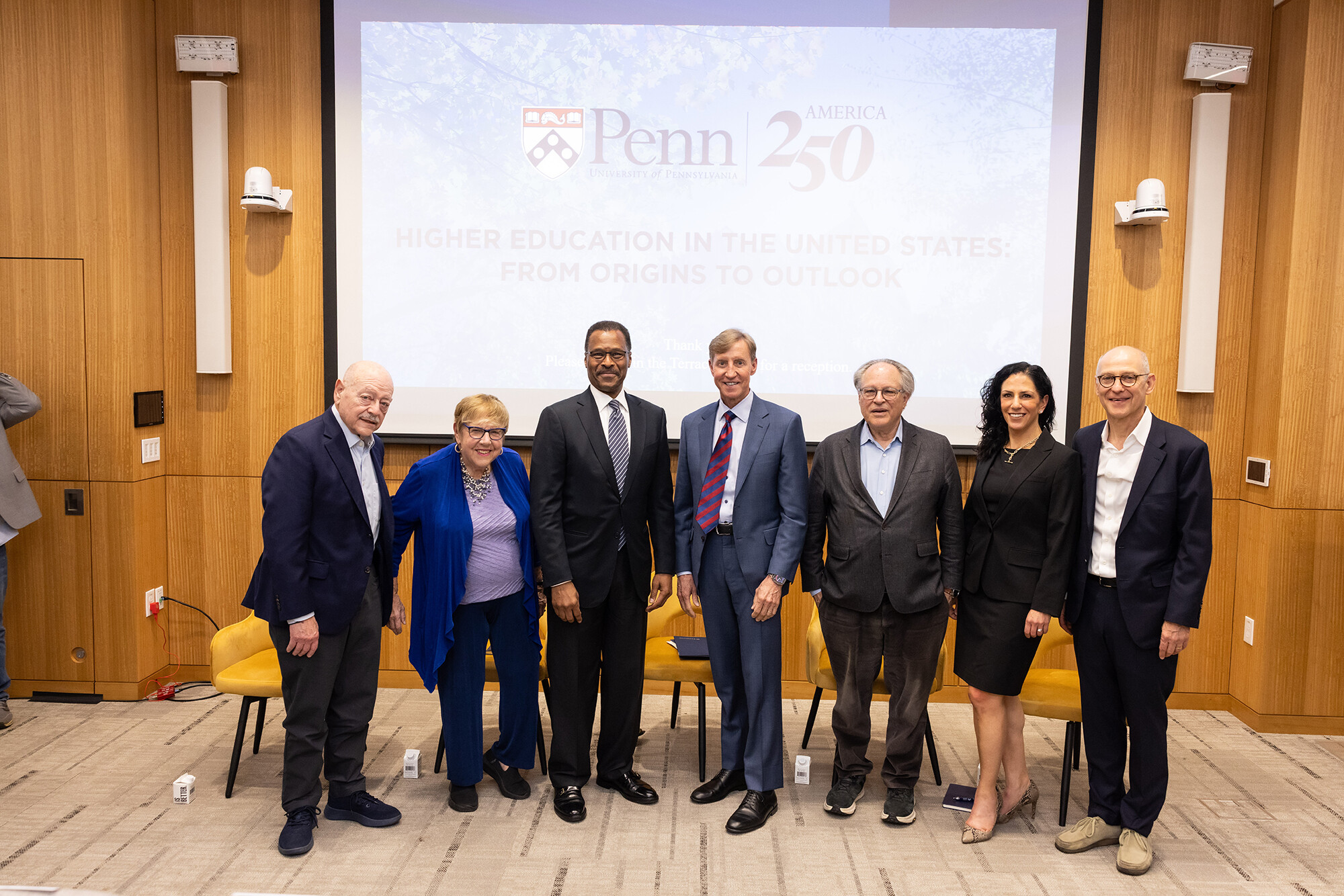 seven members of a higher ed panel including J. Larry Jameson and Katherine Strunk.