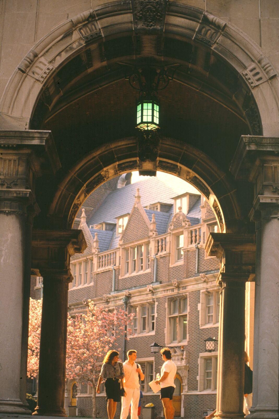 Students in the archway of the Quad, March 1989.