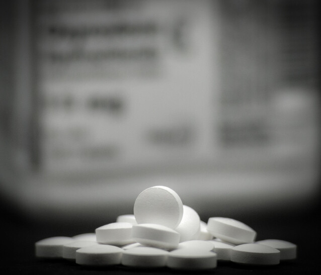 White pills in a pile.