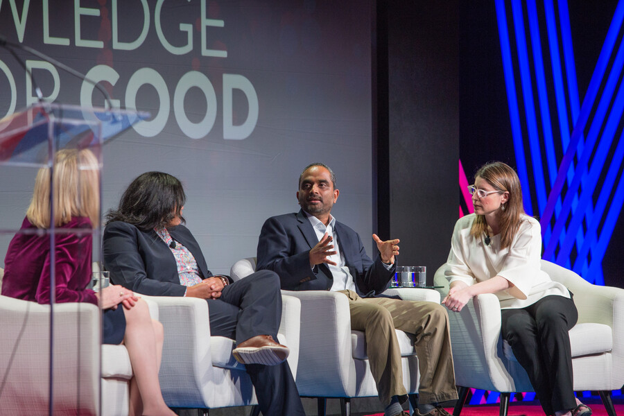 Penn President Amy Gutmann speaks with Professor Vivek Shenoy at an alumni event in Boston.
