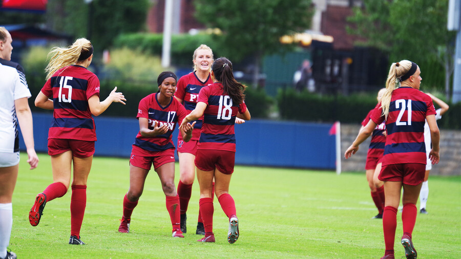 Camillia Nwokedi celebrates with her teammates