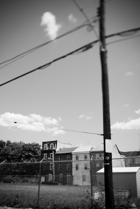 row of houses and a vacant lot