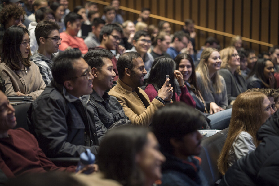 crowd of people in Wharton auditorium watching recording of The Pitch