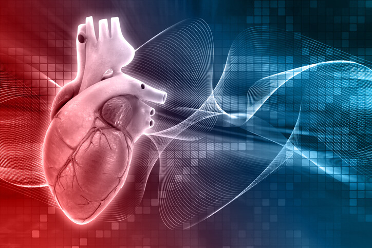   anatomically-accurate heart superimposed over graphic waves 