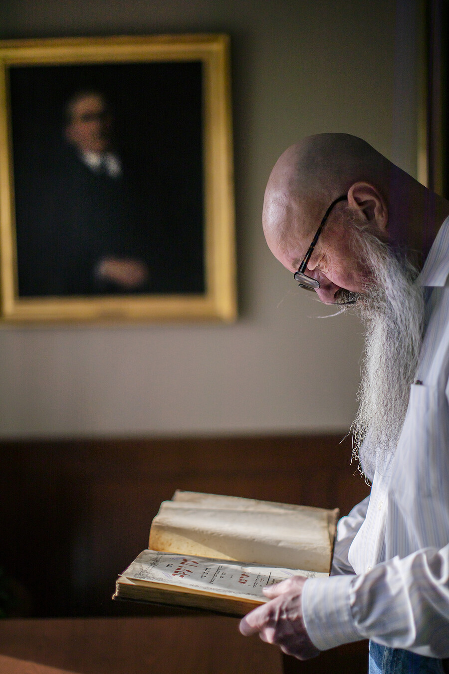 bruce nielsen reading a nazi looted book