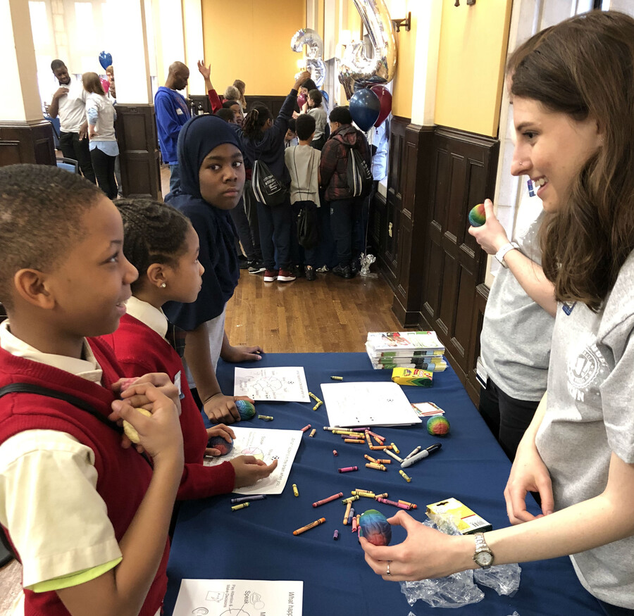 An elementary school student and a Penn graduate student talking about the brain. 
