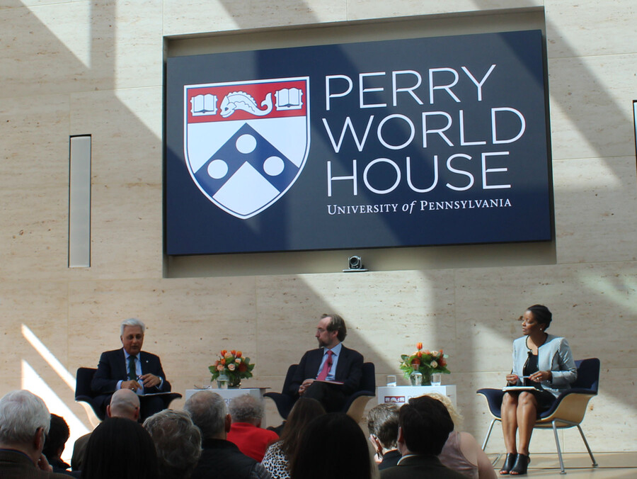 Speakers on stage at Perry World House