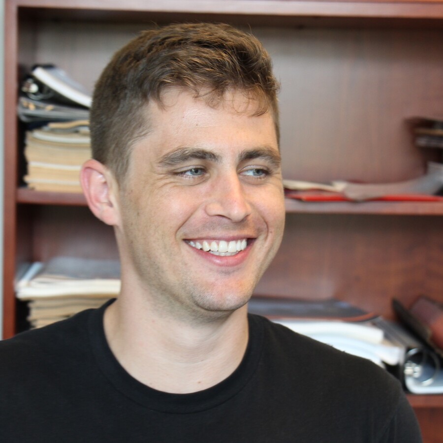 Headshot of scientist Adam Sateriale