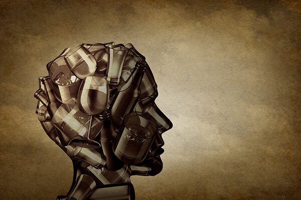 shape of a human head made of outlines of wine glasses, drink glasses and beer bottles.