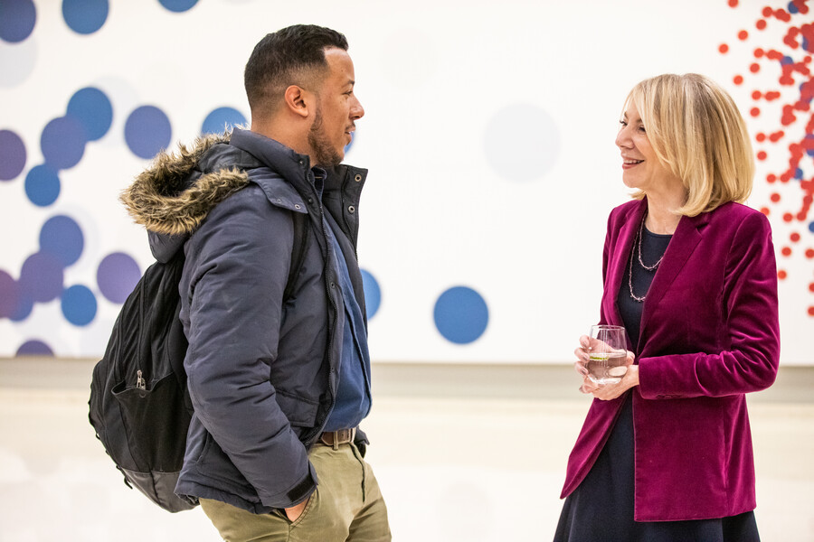 Rodriguez and Gutmann chat at reception