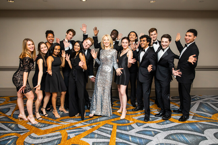 Penn president Amy Gutmann poses with Penn's a cappella group, the Penn Counterparts