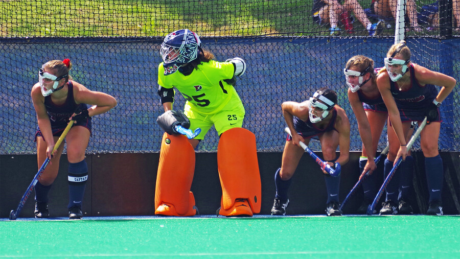 Ava Rosati and her teammates prepare to defender a corner during a game.