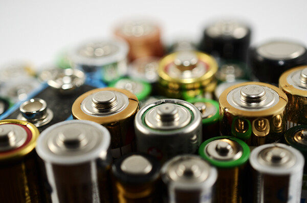 collection of assorted batteries facing upward