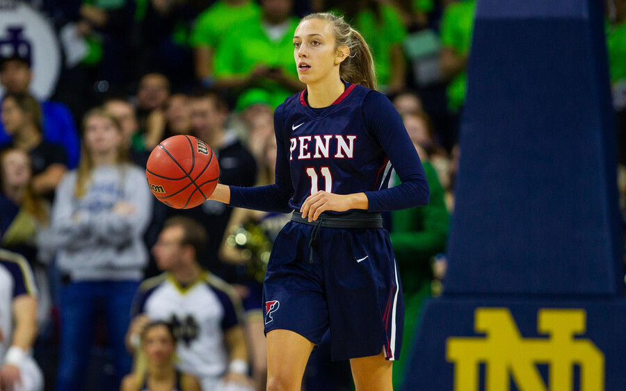 Away at Notre Dame, Kendall Grasela of the women's basketball team dribbles the ball up the court.
