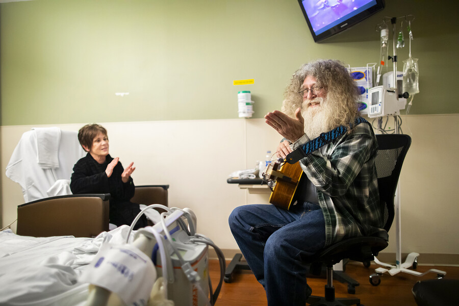 musician david falcone with outstretched hand