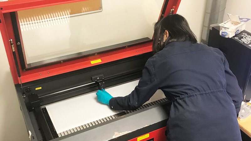 person using a 3d printer