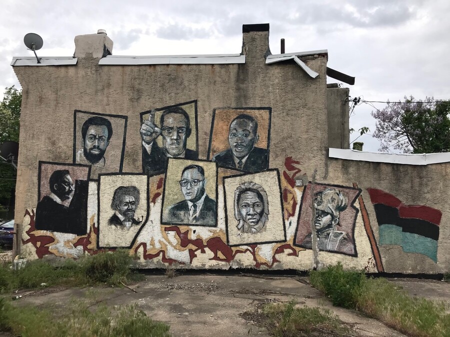 A mural showing Malcolm X, Marcus Garvey, and other African-American icons at 55th Street and Haverford Avenue in West Philadelphia.