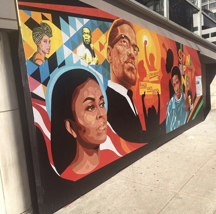 A mural painted by students at Olney Charter High School showing Malcolm X and other individuals they admire. The mural was installed outside of the Institute of Contemporary Art from December of 2016 to March of 2017.