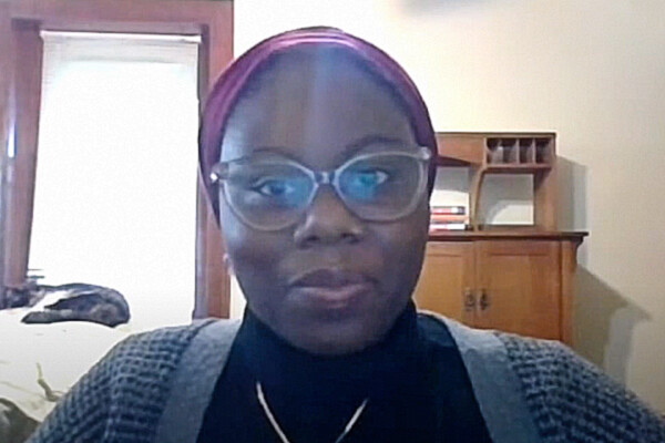 Husnaa Hashim inside with desk behind