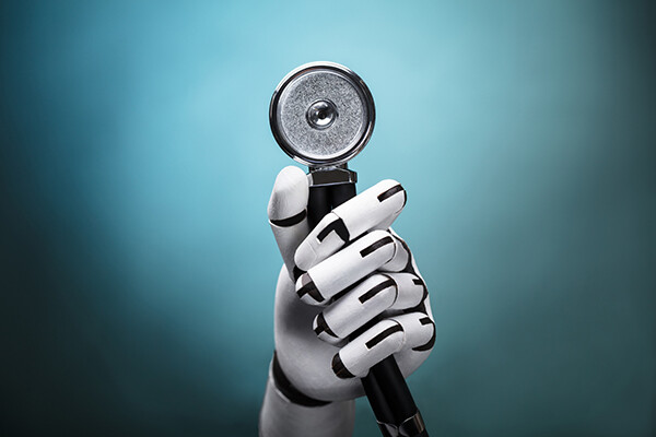 Robotic hand holding a stethoscope.