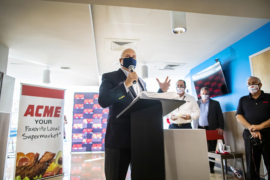 Craig Carnaroli speaks at ribbon cutting at ACME