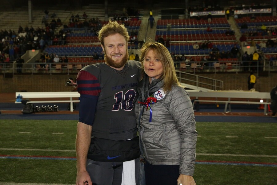Alek Torgersen poses with his mother on Senior Night in 2016.&nbsp;