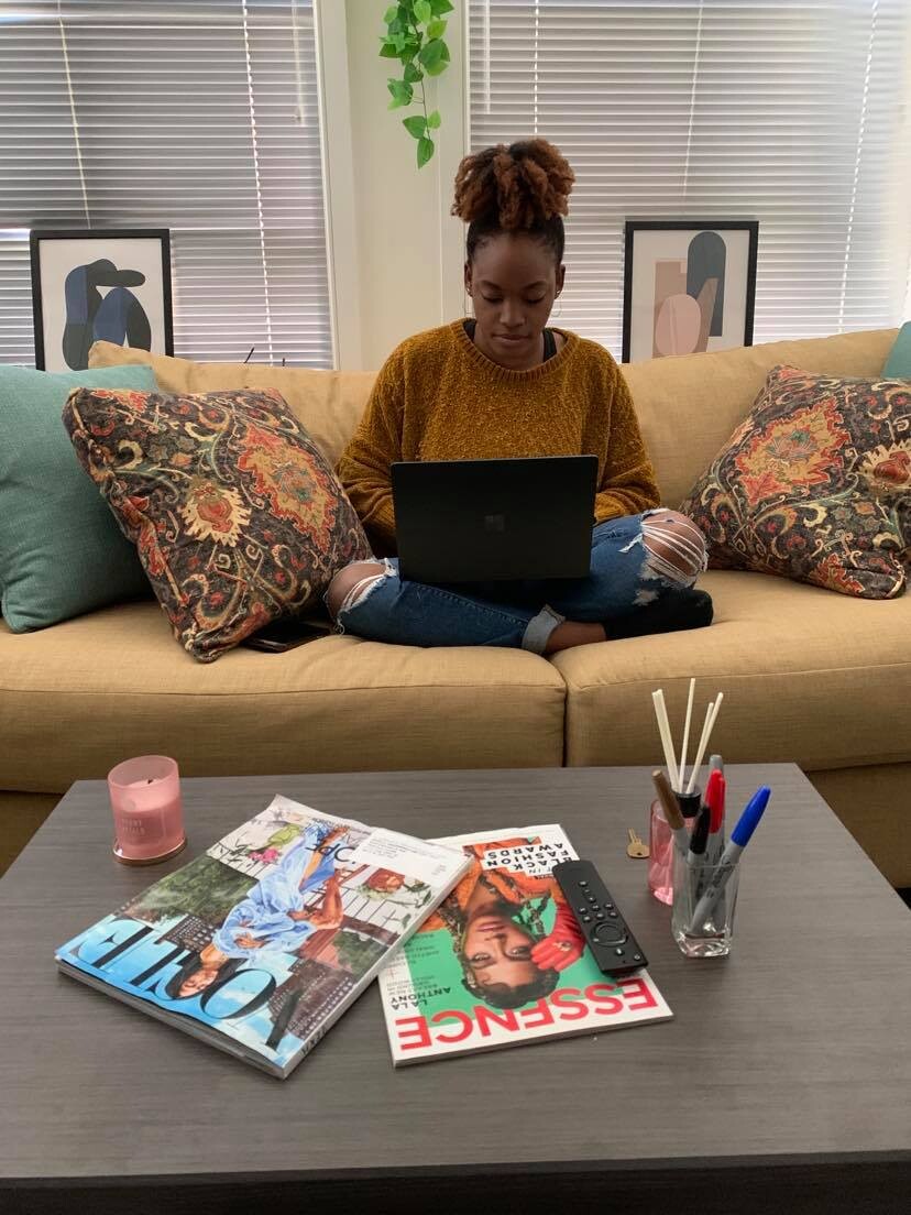 Ami Ikuenobe working in her apartment