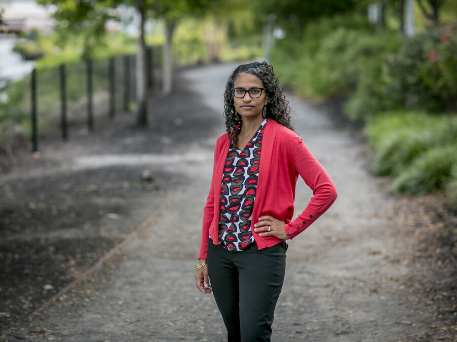 Eugenia South poses in a forestry area.
