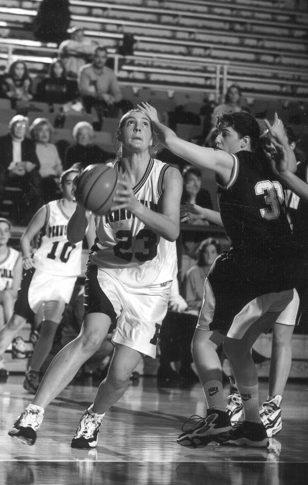 Diana Caramanico dribbles the ball to the basket during a game.