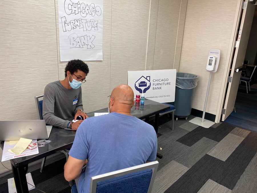 Andrew setting a customer up at the office