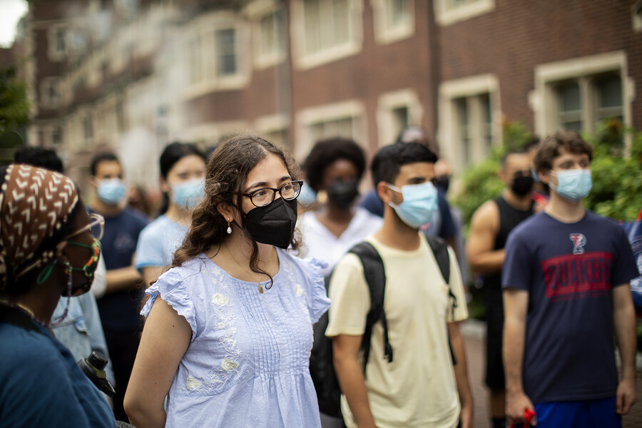 students standing outside on Penn's campus