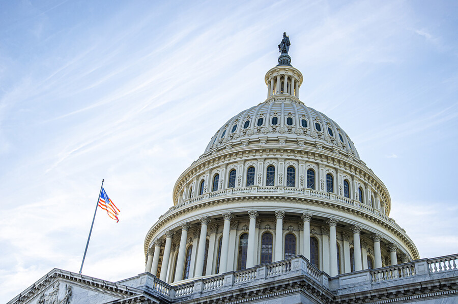 U.S. Capitol building with American flag 