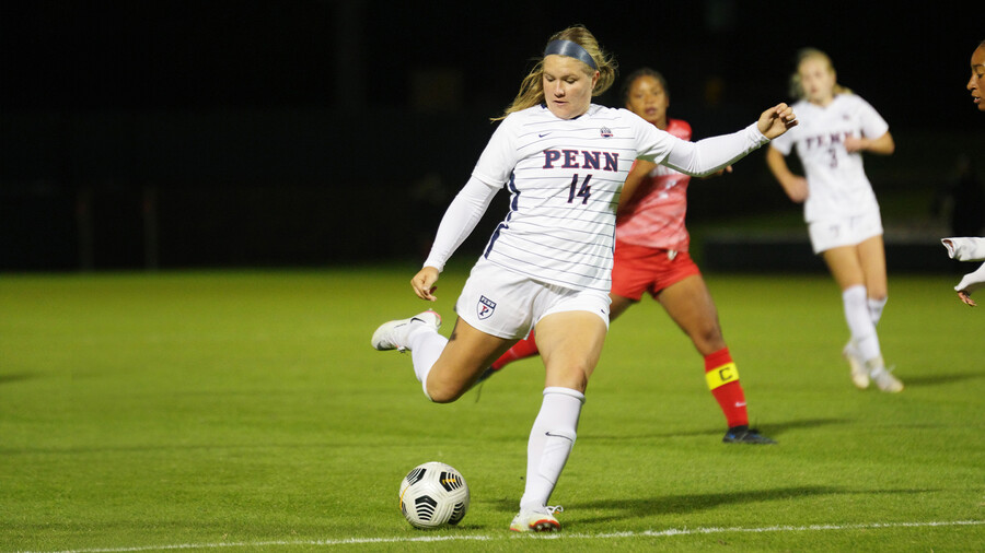 Shenk prepares to kick the ball during a home game at Rhodes Field.
