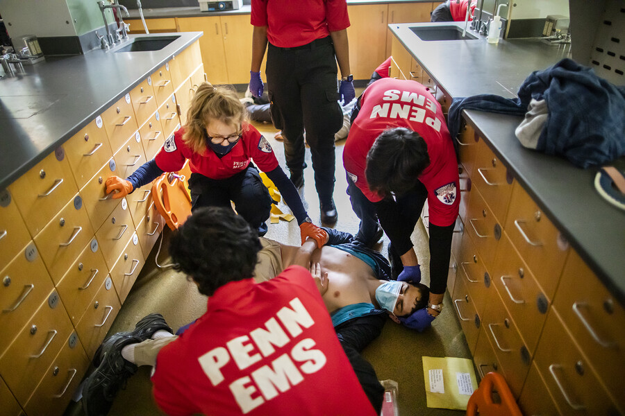 mert students treating a patient in a lab