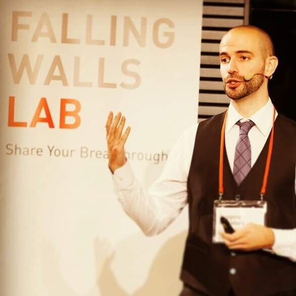 Ruggero Vigliaturo speaking at an event