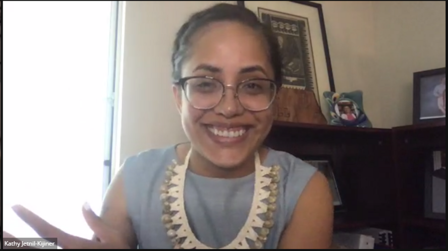 Kathy Jetn̄il Kijiner on a zoom screen smiles into the camera.