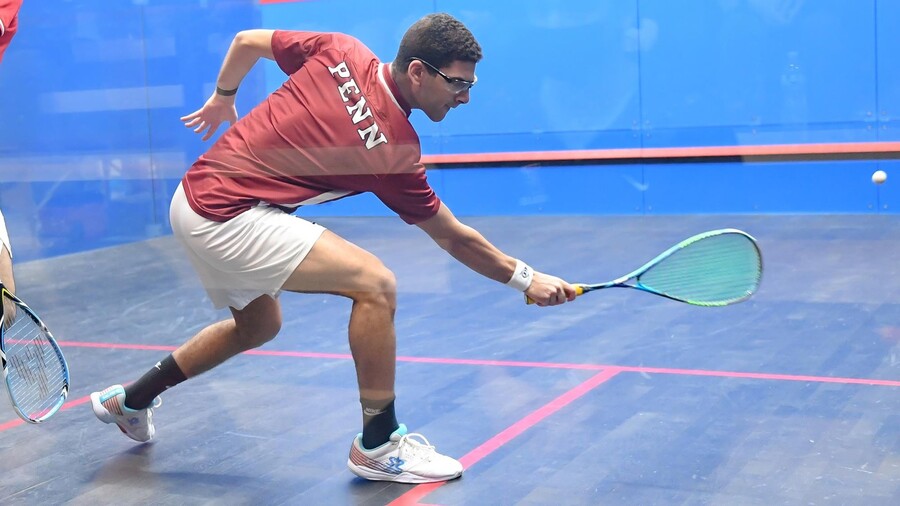 Aly Abou Eleinen swings at the ball at the Penn Squash Center.